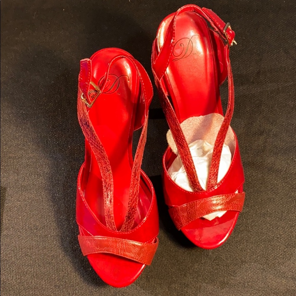 Size 8.5 pure red, snake skin shoes, 5.5 in. Heels